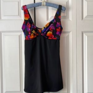 Women’s swim suit. Size 14. Nice flattering cut skirt overlay coverage